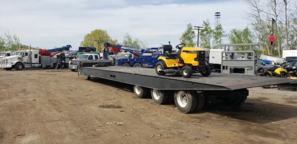 TSA-50 heavy-duty trailer loaded with small equipment, demonstrating deck capacity and stability