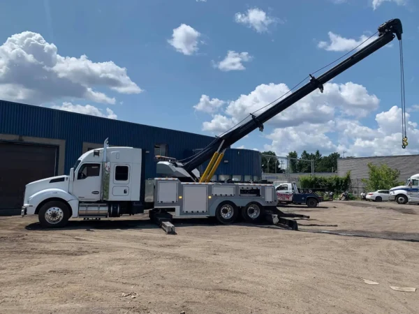 Metro Heavy Recovery 35 wrecker operating long boom extension for recovery work
