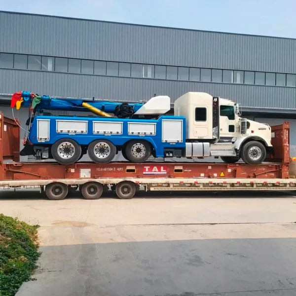 Metro Tow Trucks Heavy Recovery 35 loaded on transport trailer for delivery