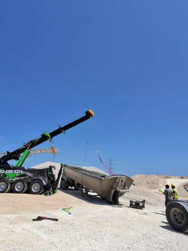 Metro Tow Trucks IND-60 heavy wrecker towing a coach bus on highway lot