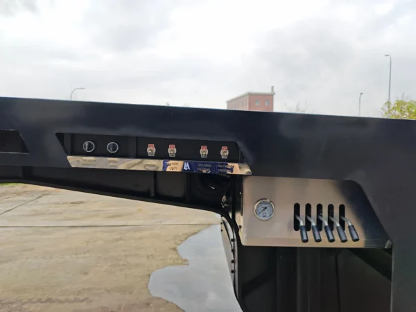 STT-50 trailer front control panel with electrical connectors, air lines, and operational switches