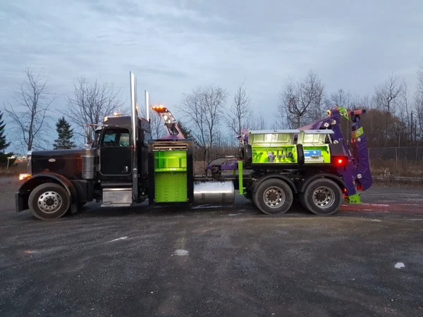 Metro MDTU-20 fully mounted on truck, detachable wrecker equipment secured for transport, outdoor yard setting