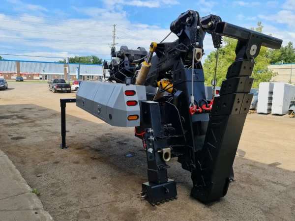 MDTU-35 detachable towing unit set up for installation, showing boom and underlift towing system and support stands