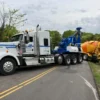 MDTU-35 detachable recovery system towing a cement mixer during roadside assistance