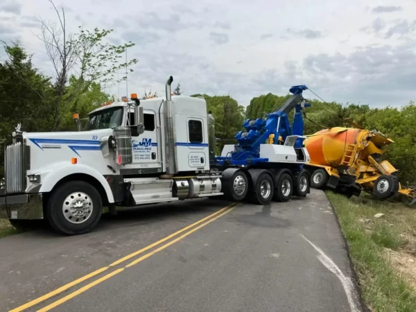 MDTU-35 detachable recovery system towing a cement mixer during roadside assistance