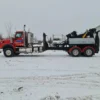 MDTU-35 detachable tow body showing whole body, boom and underlift in snow conditions