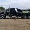 Metro RTR-25 rotator tow truck positioned for roadside truck recovery