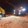 RTR-25 rotator recovery truck performing night-time snow accident rescue