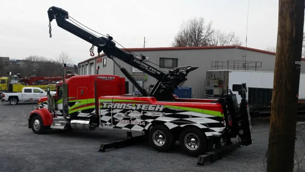 Metro Tow Trucks RTR-25 rotator with extended boom during heavy vehicle accident recovery
