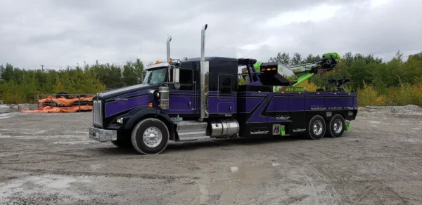 Side view of Metro RTR-25 rotator tow truck prepared for emergency recovery