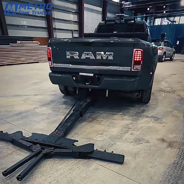 Metro Stealth hidden wheel lift self-loader converting a RAM pickup into a tow vehicle.